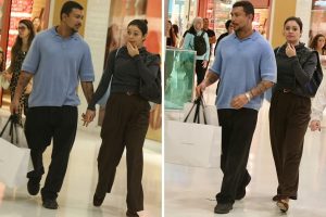 Xamã e Sophie Charlotte de mãos dadas no shopping